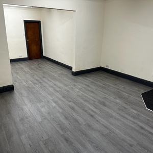 Grey LVT Flooring In A Shop