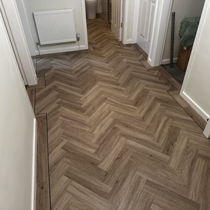 Hallway In Herringbone With Boarder